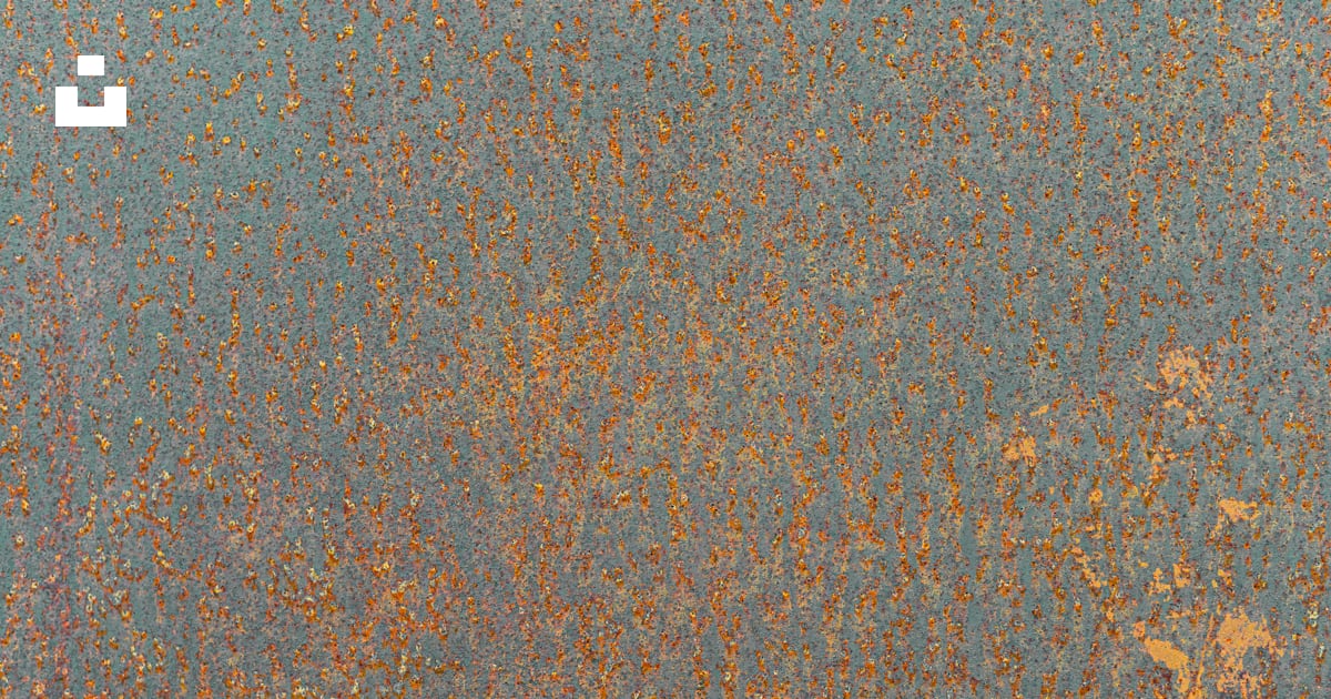 A rusted metal surface with some rust on it photo – Free Rust Image on ...
