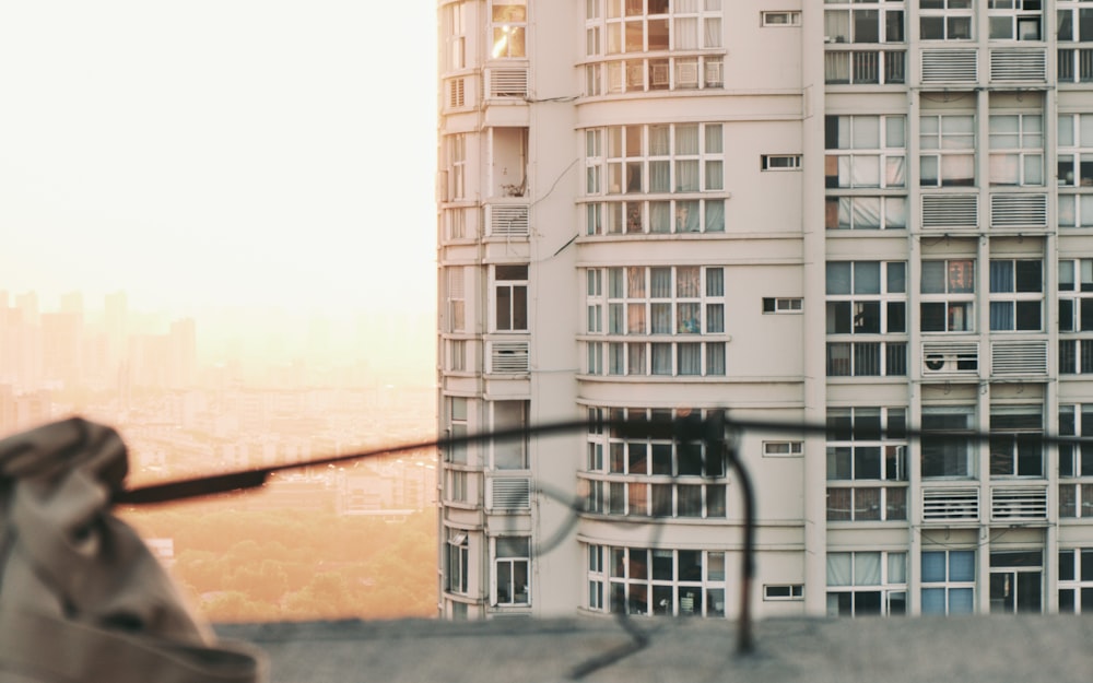 a pair of glasses sitting on top of a roof