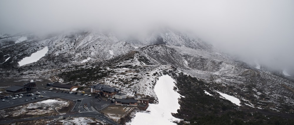 an aerial view of a snow covered mountain