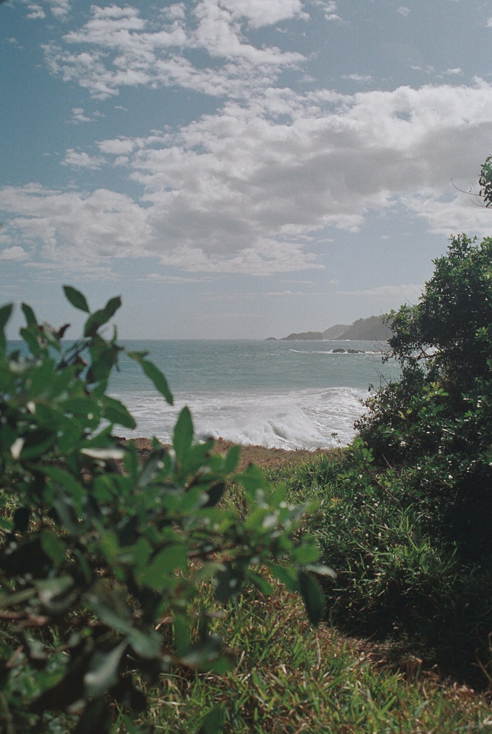 a view of a body of water from a hill