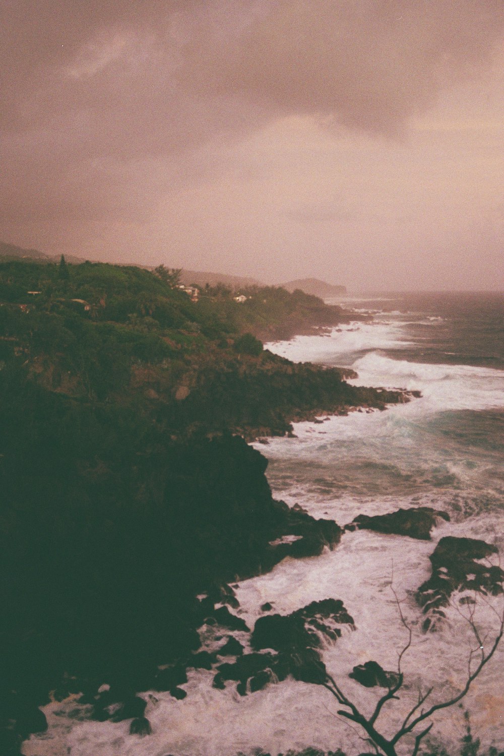 a view of the ocean from a cliff