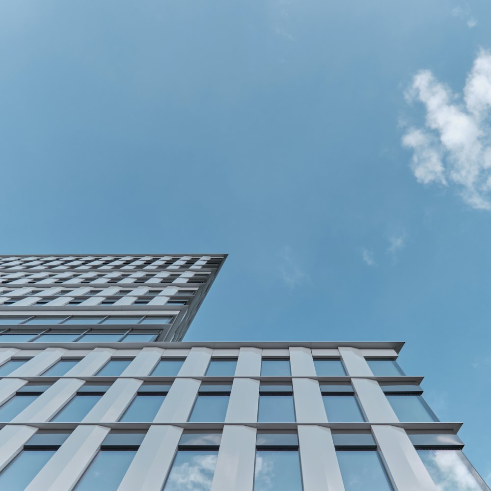 looking up at a tall building from the ground