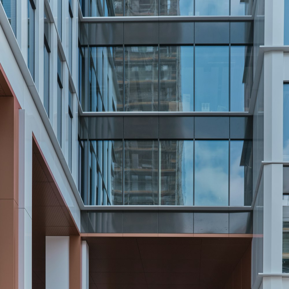 a tall building with a clock on the side of it