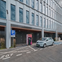 Electric vehicle charging station in a modern urban environment.