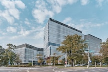 a large office building sitting on the corner of a street