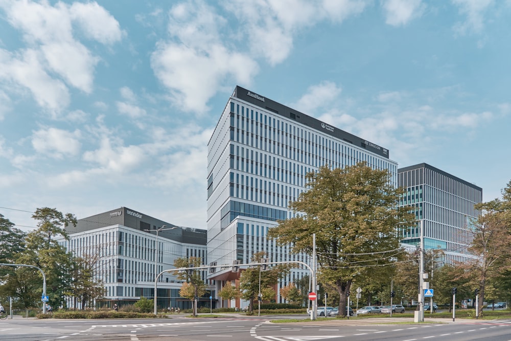 a large office building sitting on the corner of a street