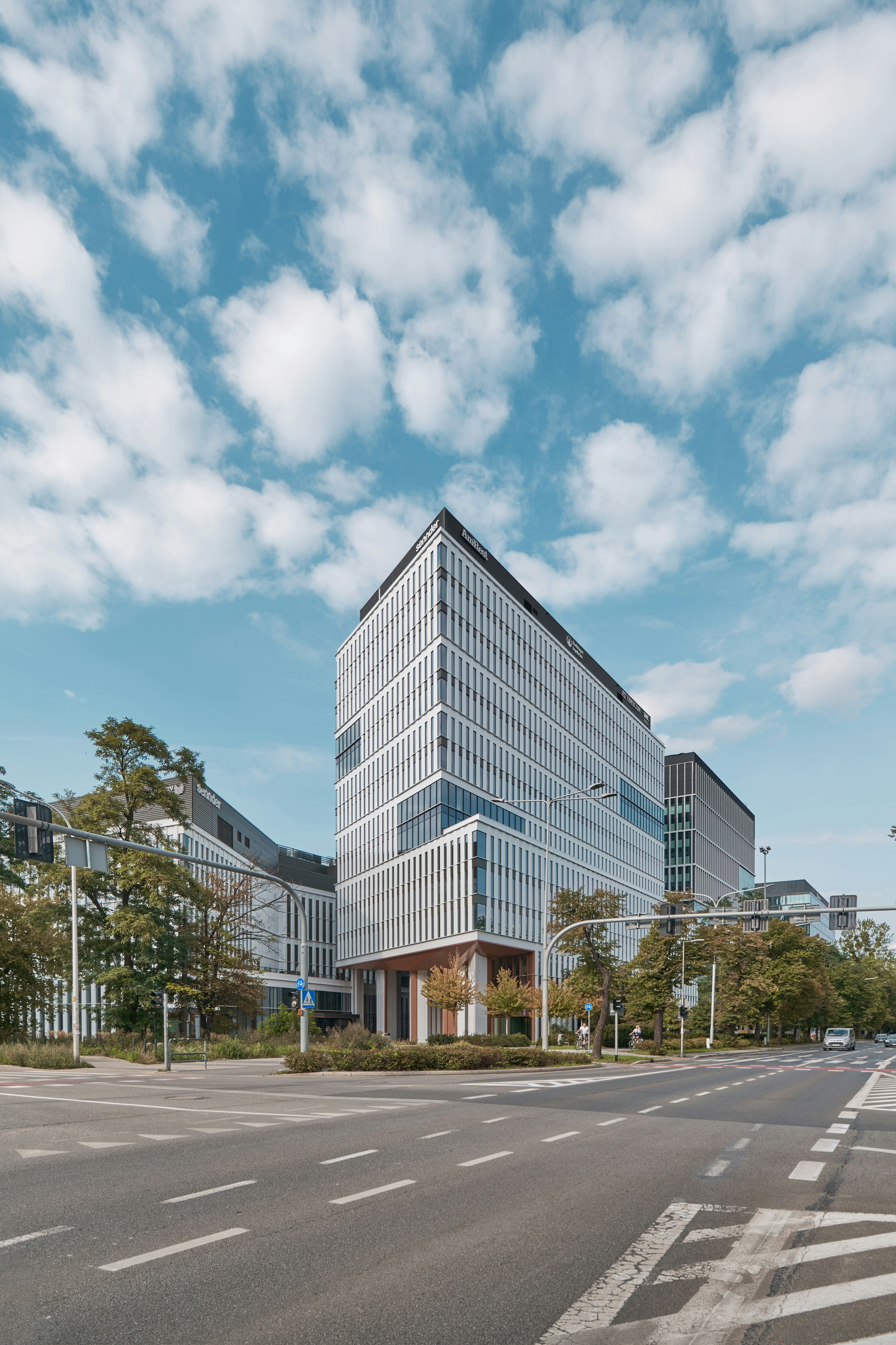 a very tall building sitting on the side of a road