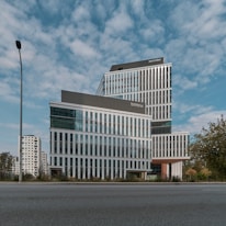 A sleek office building with smbuilderz signage at the Swiss Centre, Islamabad.