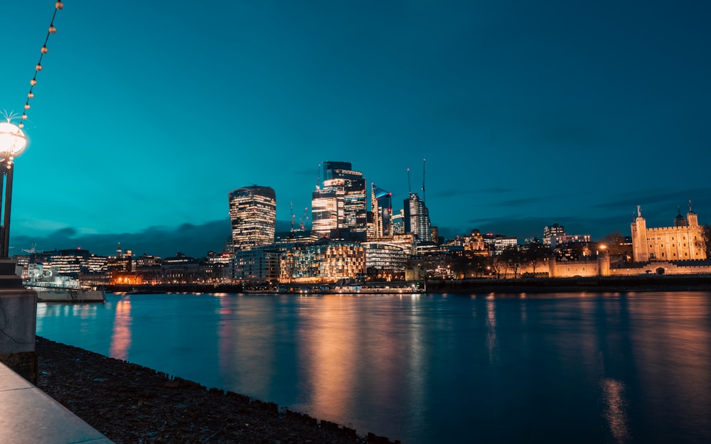 a view of a city at night from across the water