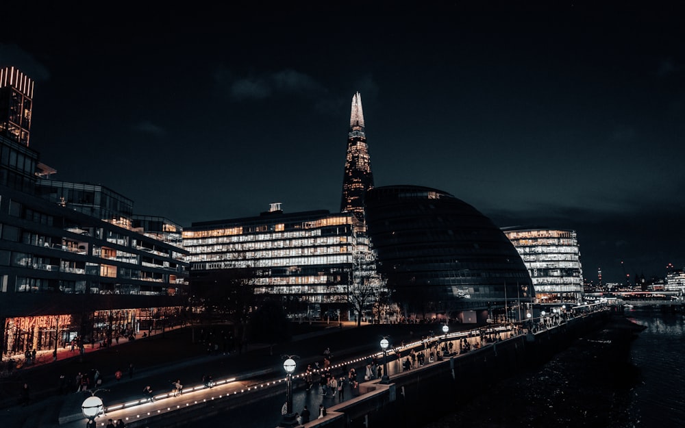 a view of a city at night from across the river