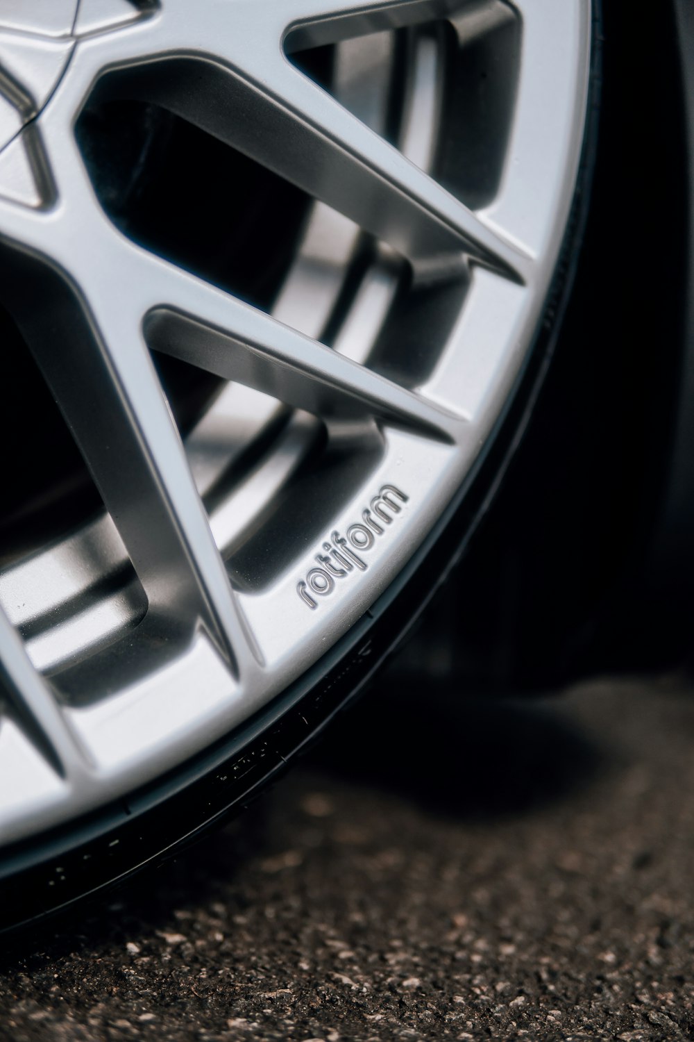 a close up of a tire on a car