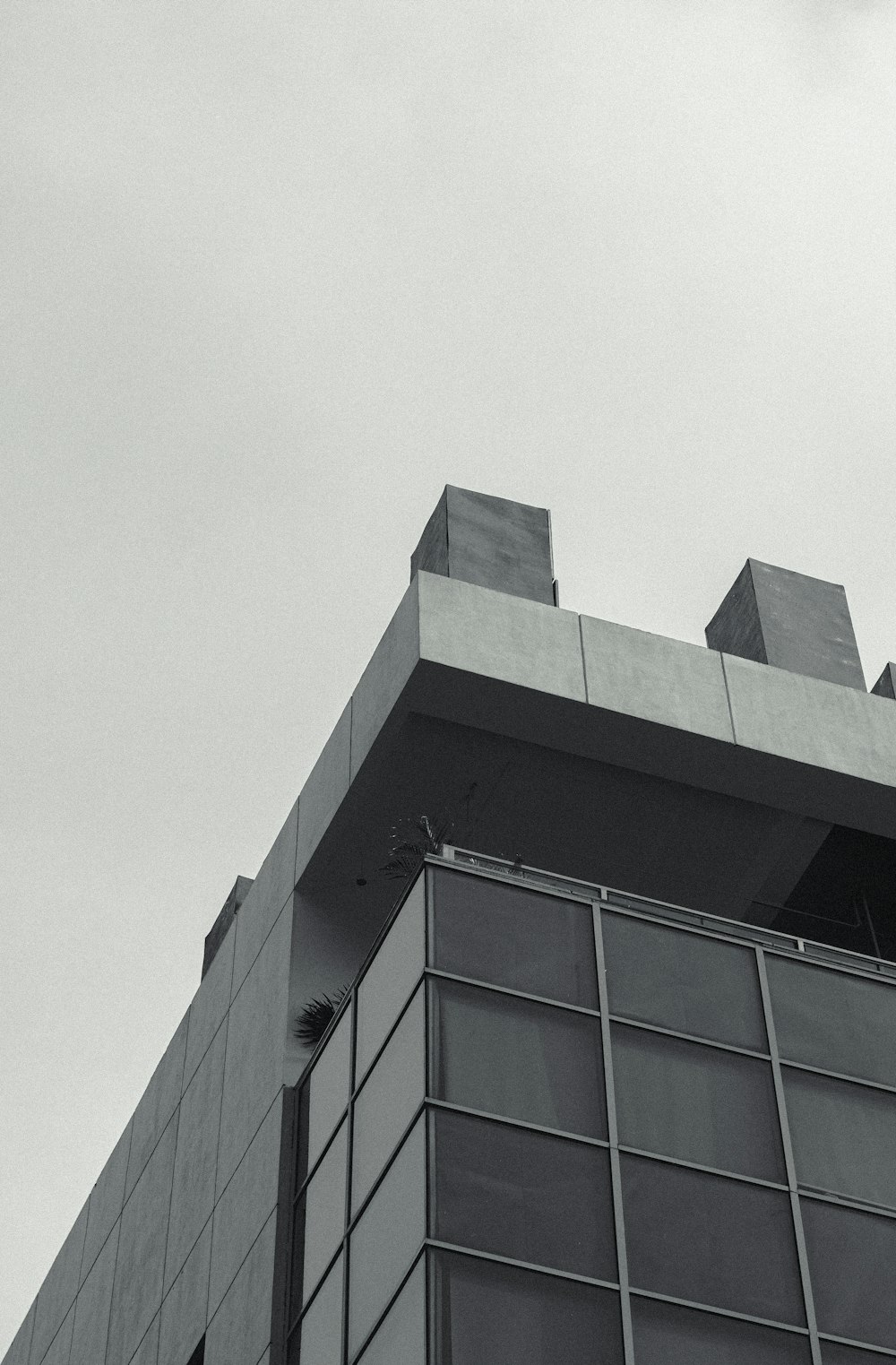 a black and white photo of a tall building