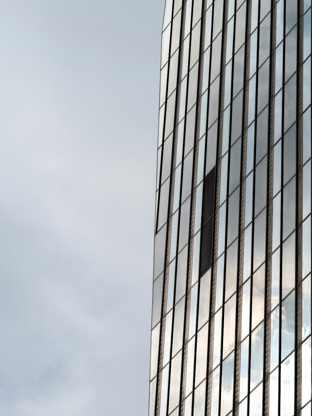 a very tall building with a clock on the side of it