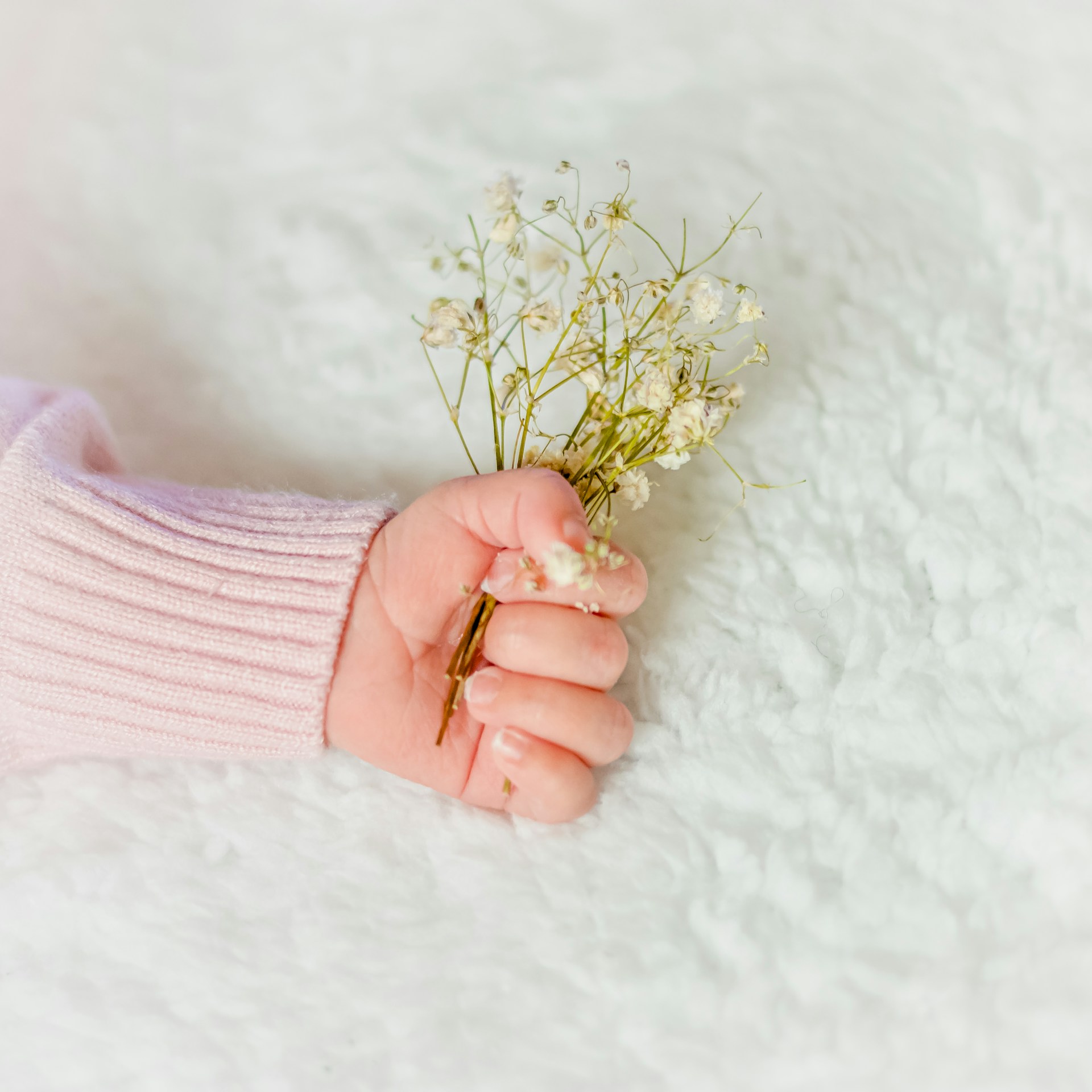woman wearing yellow long-sleeved dress under white clouds and blue sky during daytime