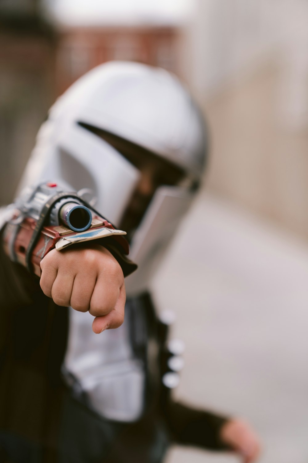 a close up of a person pointing a gun