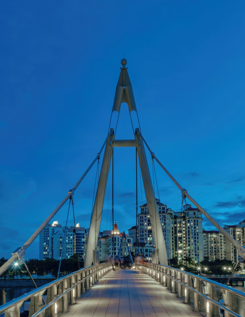 a bridge that has lights on the sides of it