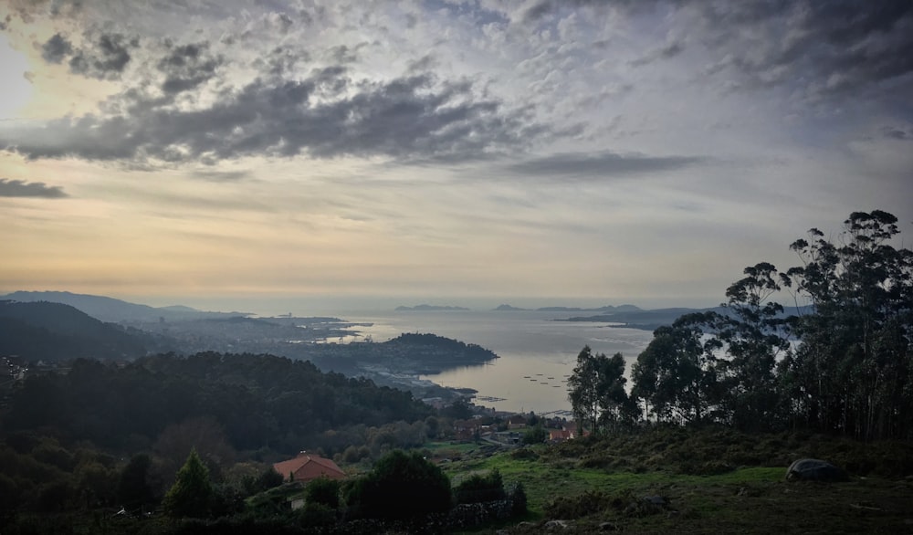 a view of a body of water from a hill