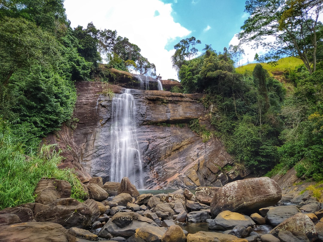 a waterfall with a large amount of water coming out of it,