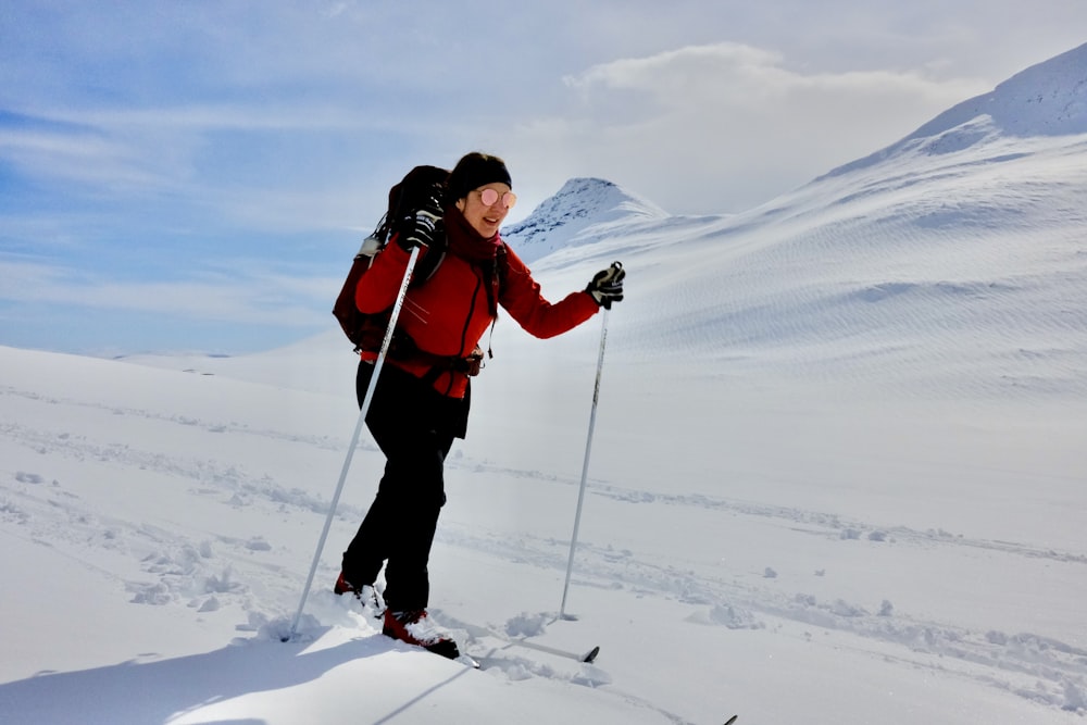 a person on skis in the snow