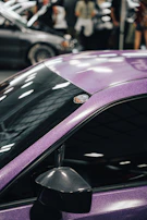 A before-and-after split showing a dull car side and the same side brilliantly polished.