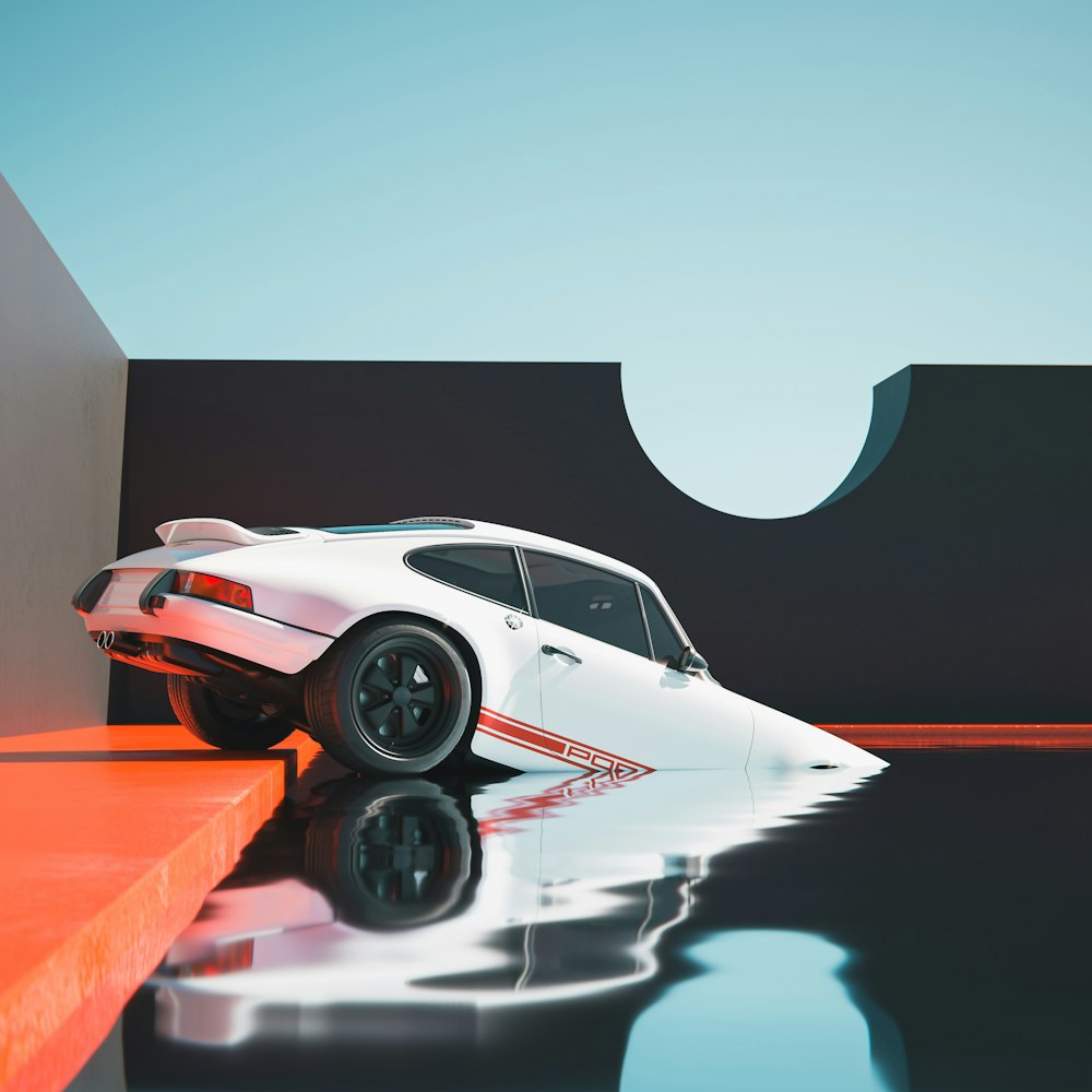 a white sports car sitting on top of a reflective surface