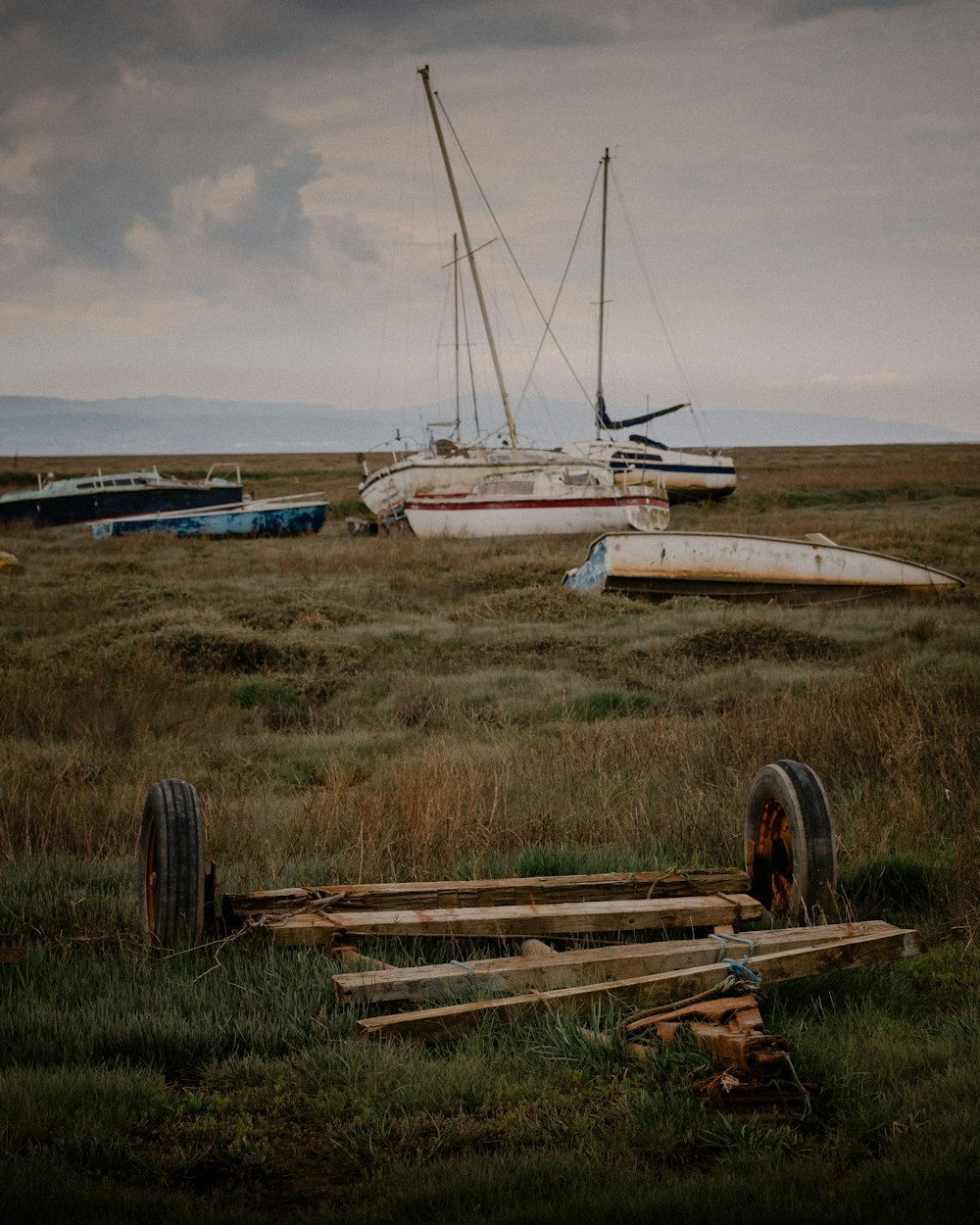 a field with a bunch of boats in it