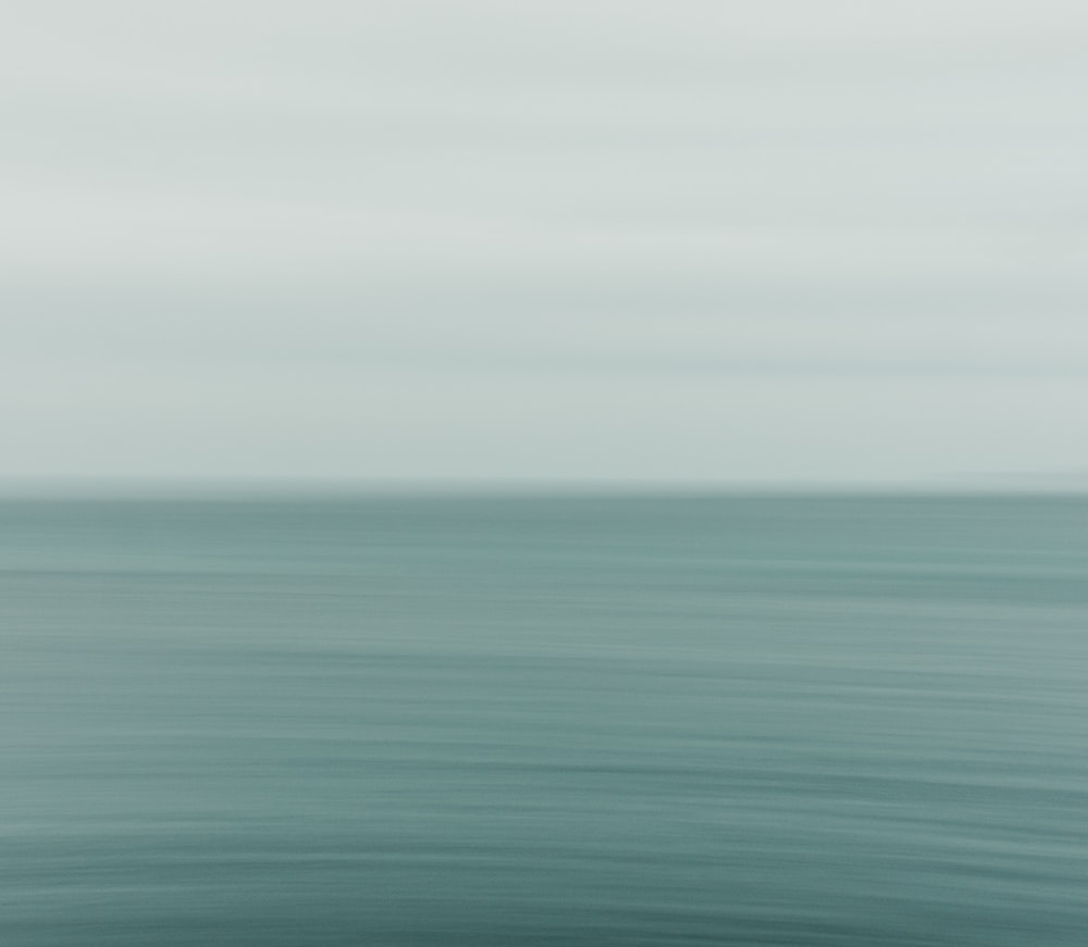 a blurry photo of a body of water