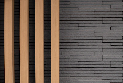 Built-in wall units with matte black accents and subtle gold details in a luxury Aspen residence.