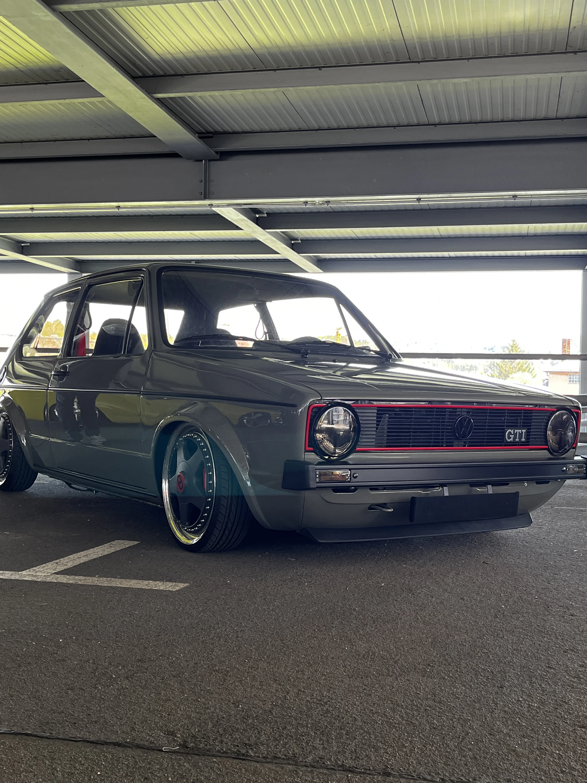 woman wearing yellow long-sleeved dress under white clouds and blue sky during daytime