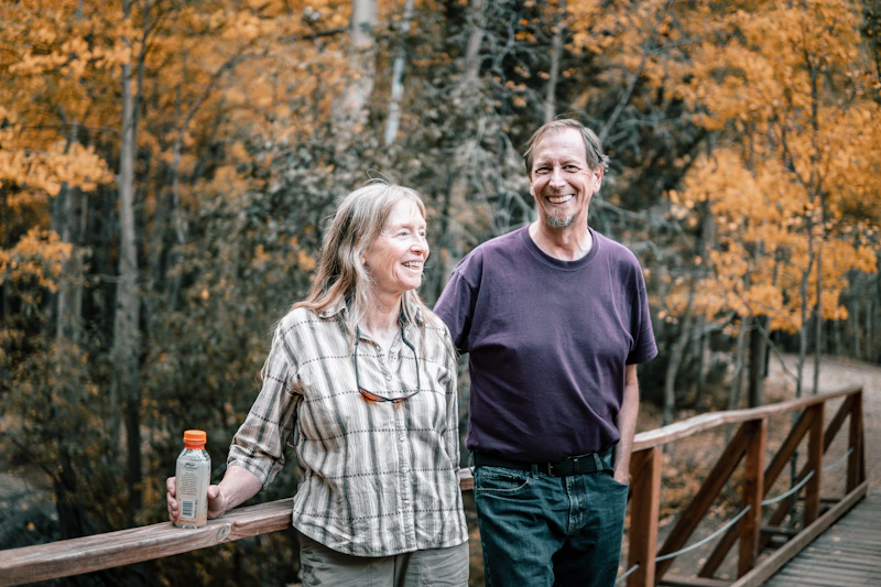 Couple standing on a bridge