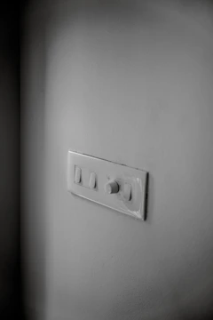 Smart home installation featuring wall-mounted control panels and ambient lighting.