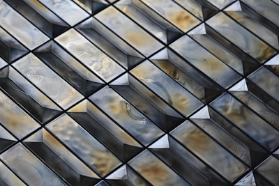 Close-up of glossy ceramic tiles arranged in a modern pattern.