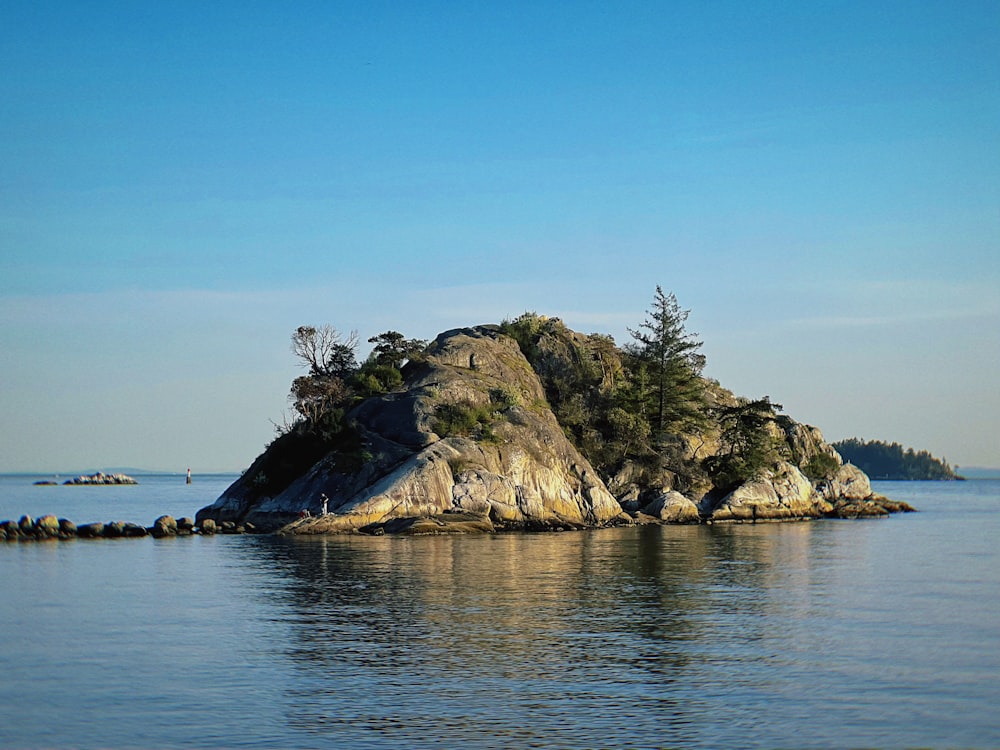 a small island in the middle of a body of water