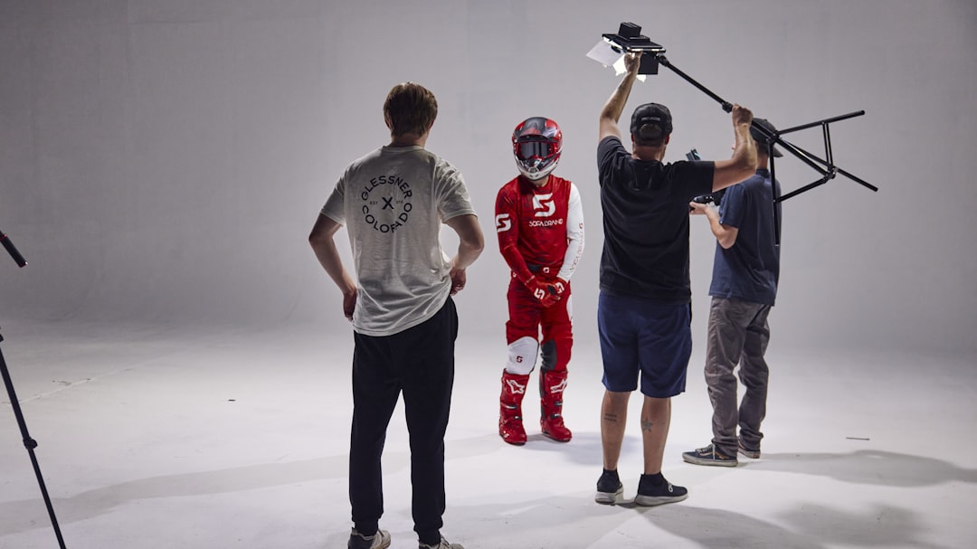 a group of people standing around each other, Some of our favorite behind the scenes flicks from one of our biggest proj