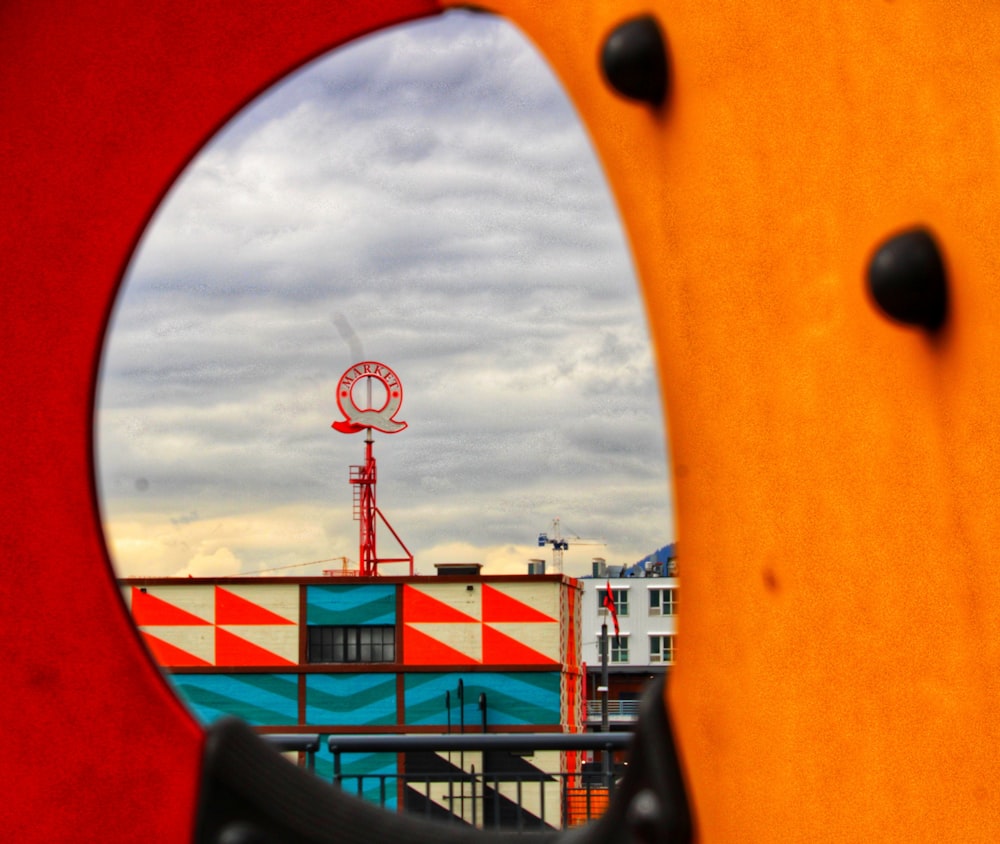 a view of a building through a mirror