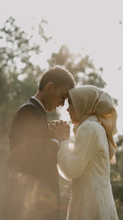 A serene moment of a couple holding hands, surrounded by glowing mystical flames