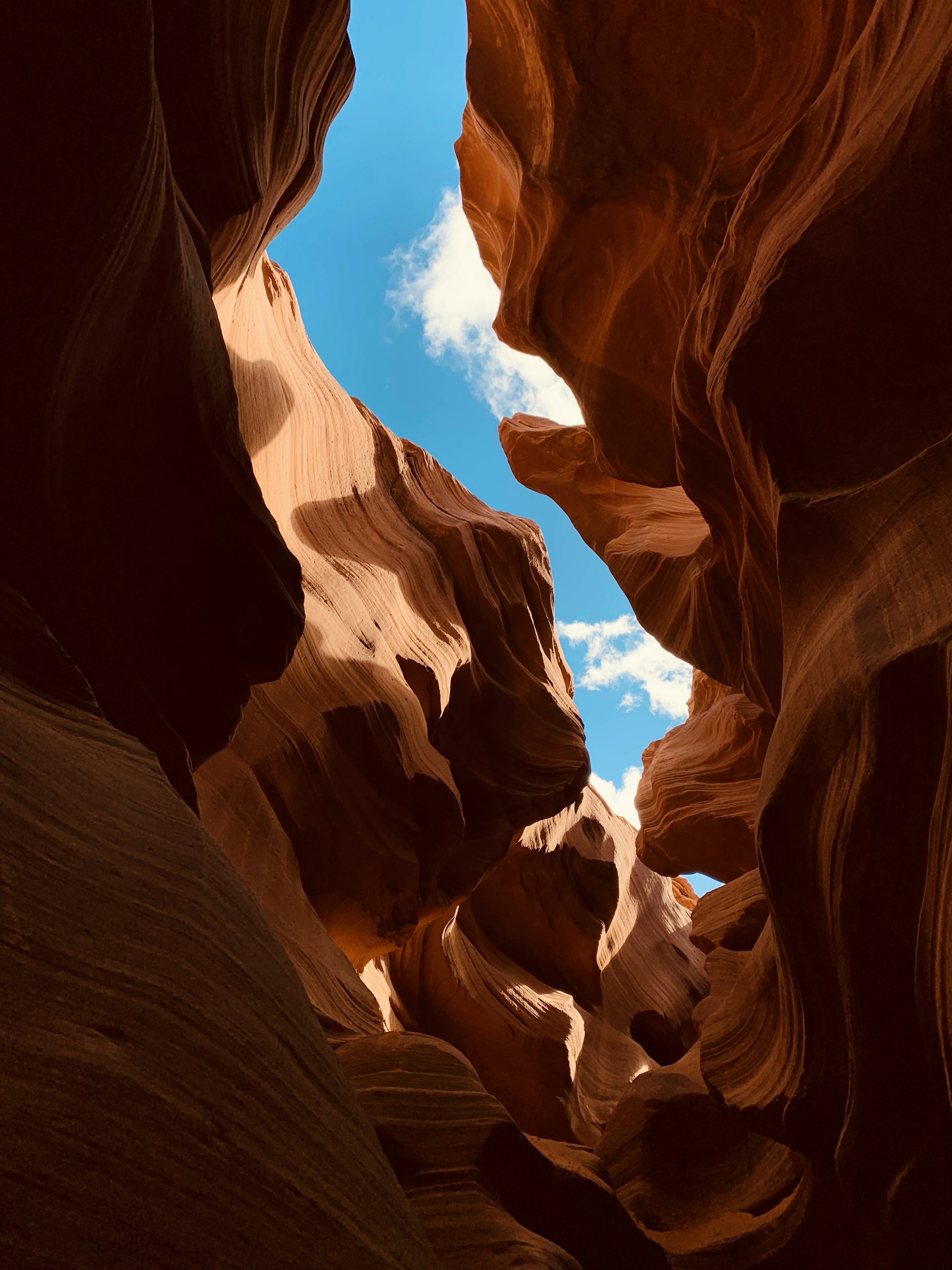 a narrow slot in the side of a canyon