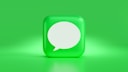 a green square with a white speech bubble