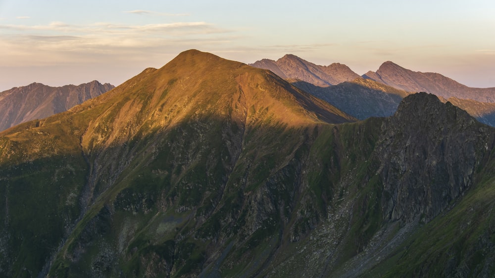 a view of a mountain range at sunset