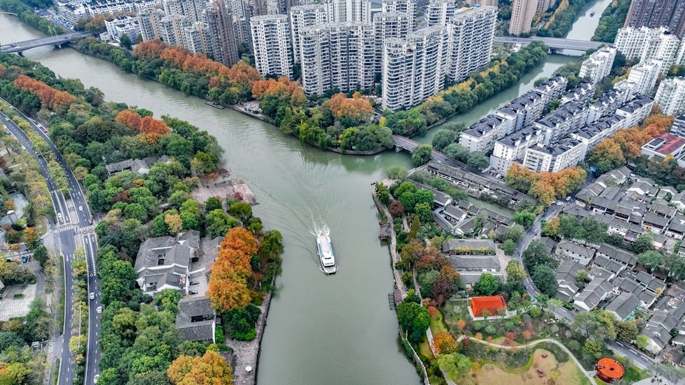 an aerial view of a river running through a city