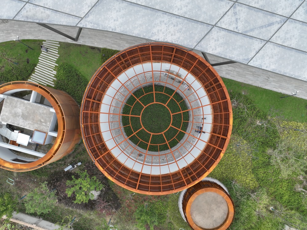 an aerial view of a circular structure in a park