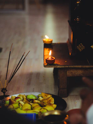 A serene altar with candles, crystals, and incense smoke curling upwards.