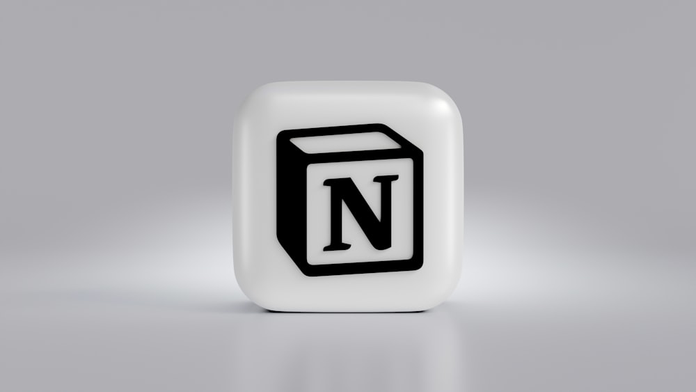 a black and white block with the letter n on it
