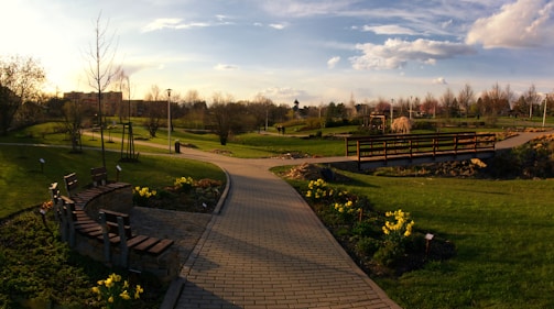 A serene park area with green spaces and pathways.
