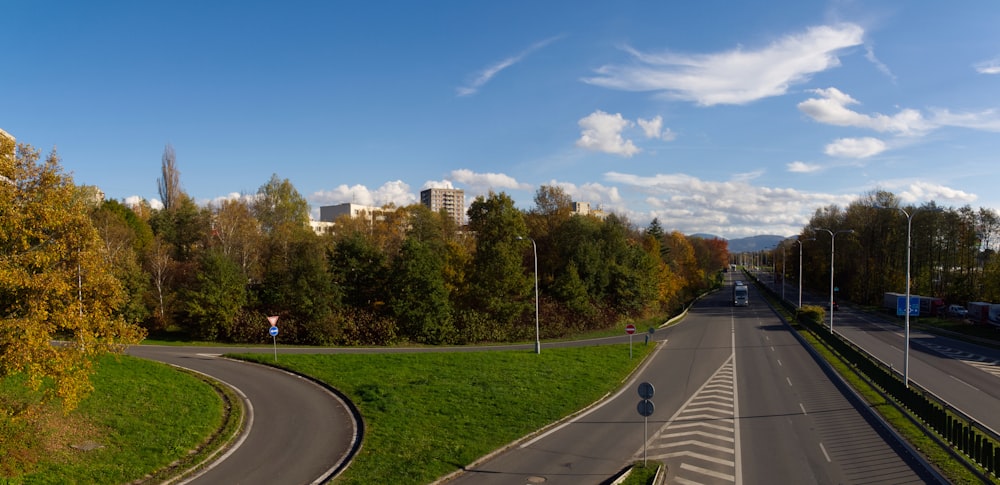 a view of a street with a curve in the road