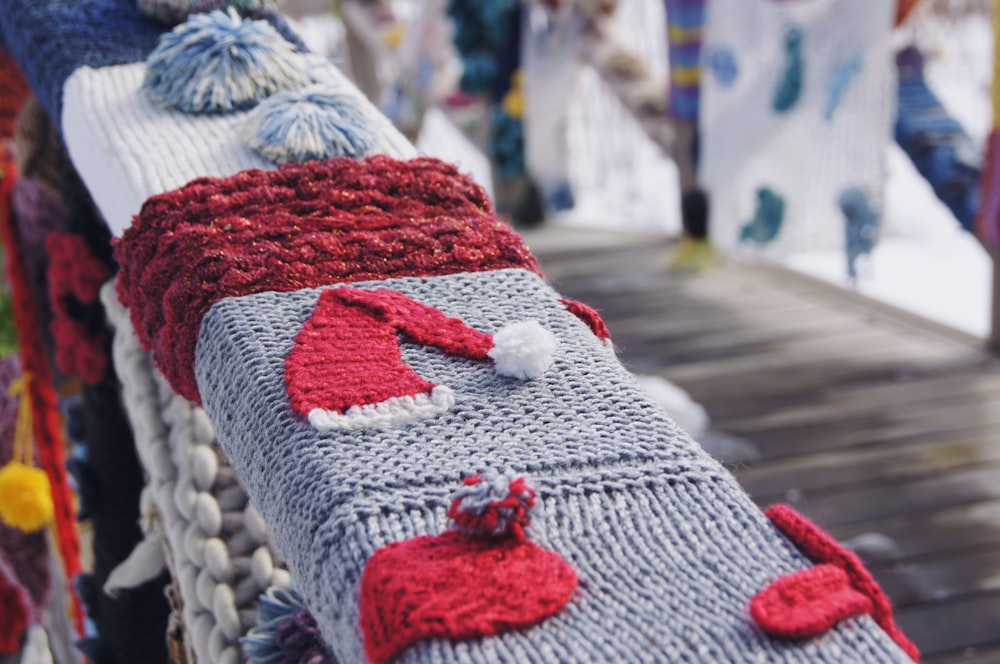 a close up of a knitted bench cushion