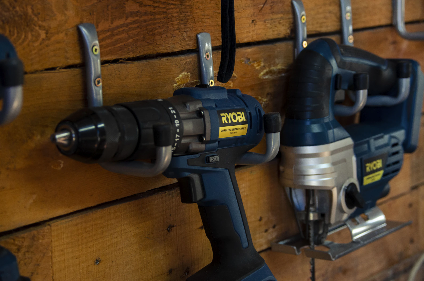 Power drills organized within a practical workshop tool storage area
