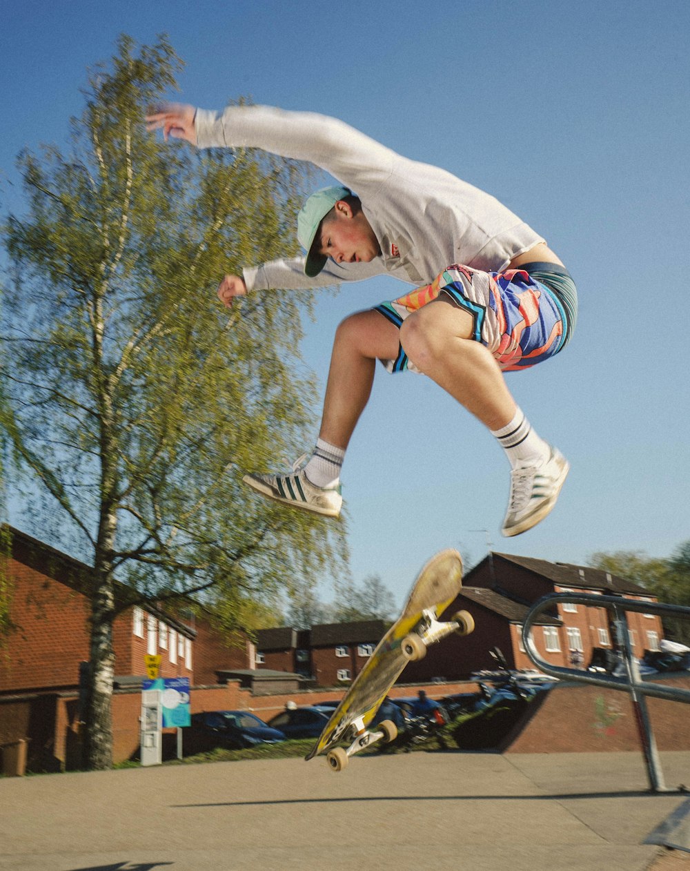 a man flying through the air while riding a skateboard