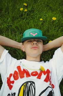A close-up of a fun, quirky t-shirt with a witty saying about gardening, laid out on a rustic wooden table.