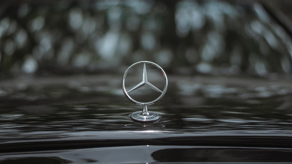 a mercedes emblem on the hood of a car
